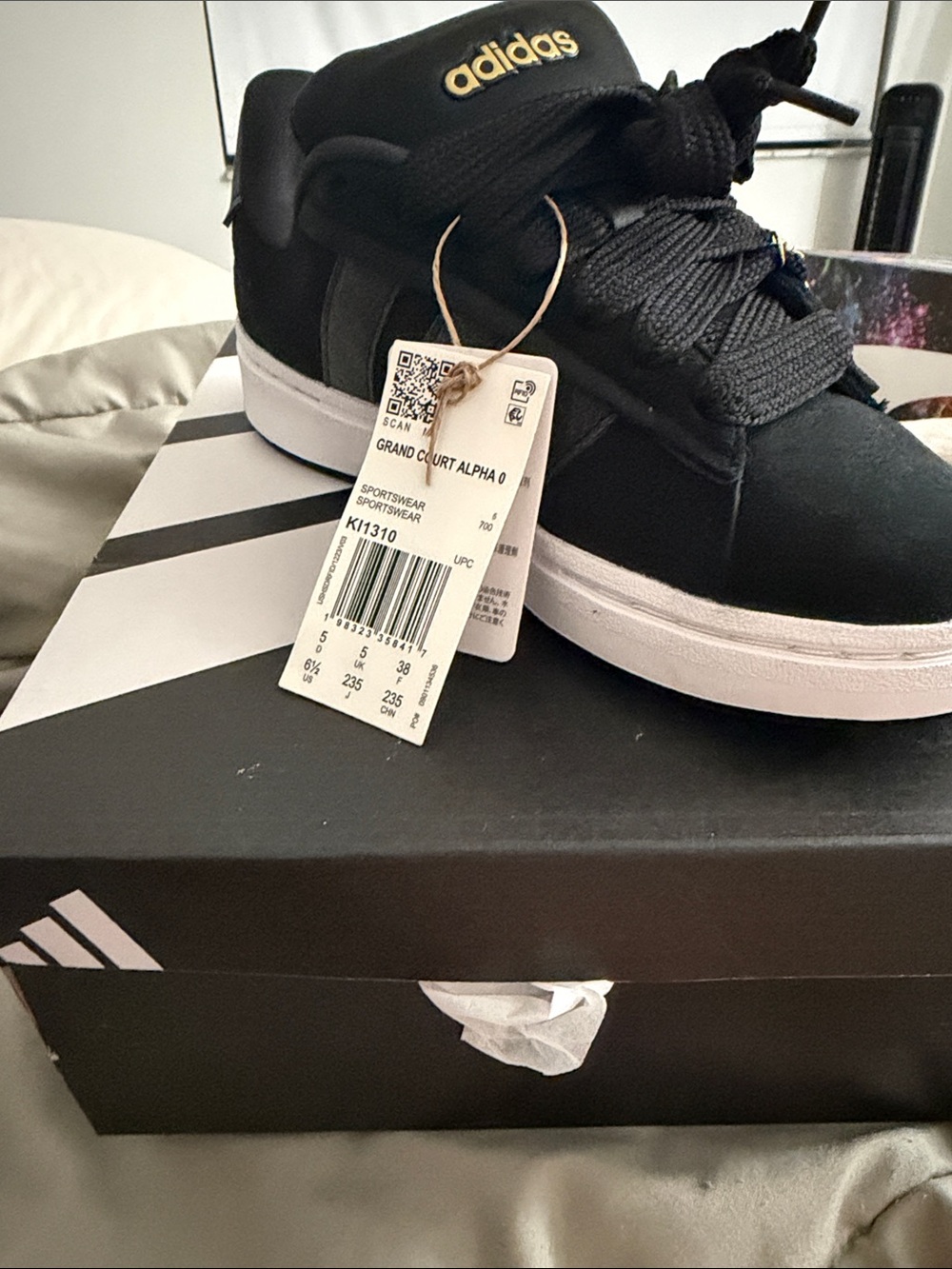 adidas Black and White Low-Top Sneakers with Gold Logo